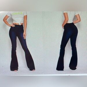 Vibrant miu. Centered line bell bottom jeans. Size 7 ( w 27).